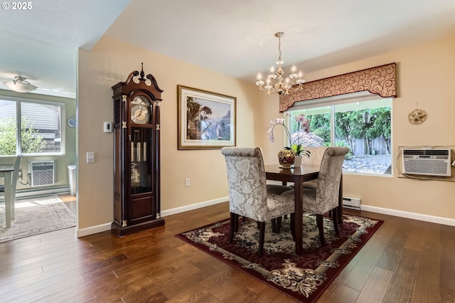 dining room with a chandelier, plenty of natural light, dark wood-type flooring, and a wall unit AC
