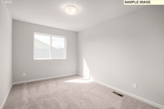 empty room featuring carpet