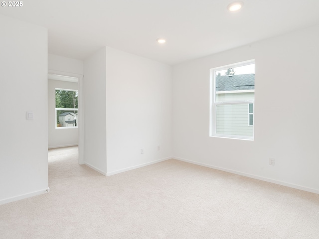 5905 NE 121st Way, Vancouver, WA 98686 - unfurnished room featuring light carpet, baseboards, and recessed lighting