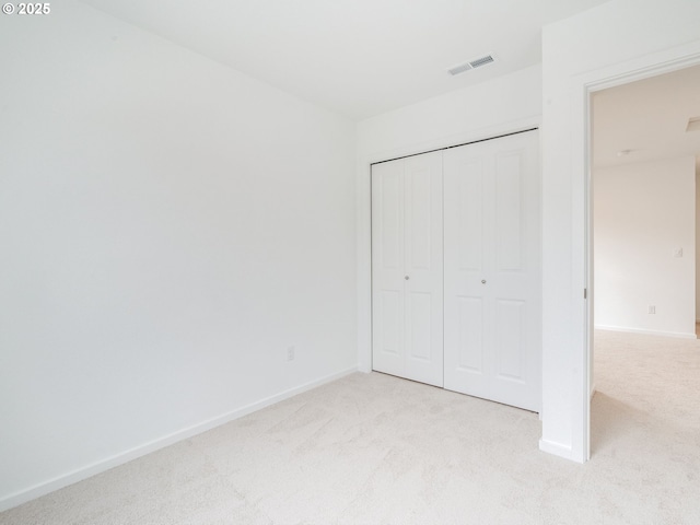 5905 NE 121st Way, Vancouver, WA 98686 - unfurnished bedroom with light colored carpet, a closet, visible vents, and baseboards