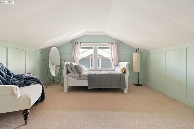 4134 N Concord Ave, Portland, OR 97217 - bedroom with a decorative wall, vaulted ceiling, and light carpet