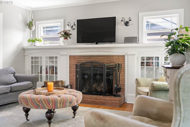 4134 N Concord Ave, Portland, OR 97217 - living room with ornamental molding, wood finished floors, and a fireplace