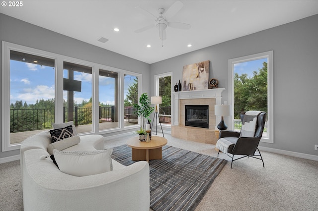 2350 SW Turner Rd, West Linn, OR 97068 - carpeted living area featuring a ceiling fan, a fireplace, recessed lighting, and healthy amount of natural light