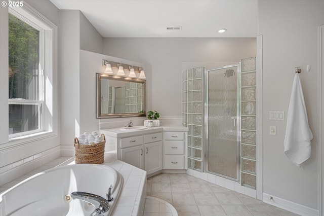 2350 SW Turner Rd, West Linn, OR 97068 - bathroom with a stall shower, vanity, a jetted tub, and tile patterned flooring