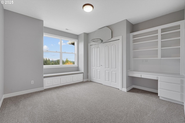 2350 SW Turner Rd, West Linn, OR 97068 - unfurnished bedroom with light colored carpet, built in desk, and a closet