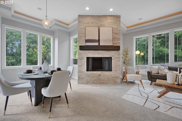 2350 SW Turner Rd, West Linn, OR 97068 - dining area with ornamental molding, light carpet, a tray ceiling, a fireplace, and recessed lighting