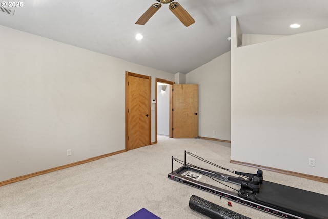 workout area with ceiling fan, lofted ceiling, and carpet