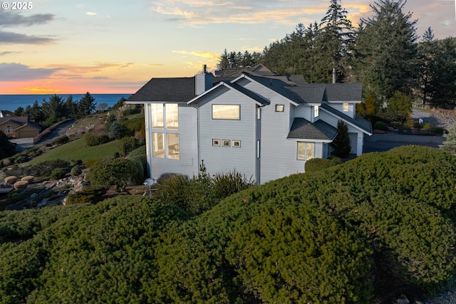 view of property exterior at dusk