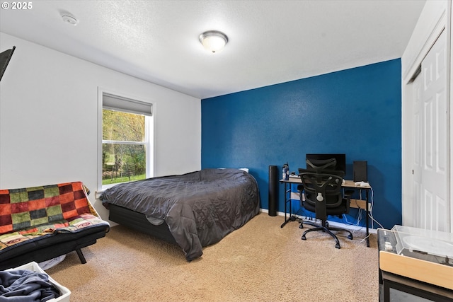 34336 Stices Gulch Rd, Baker City, OR 97814 - carpeted bedroom with a closet, a desk, and an accent wall
