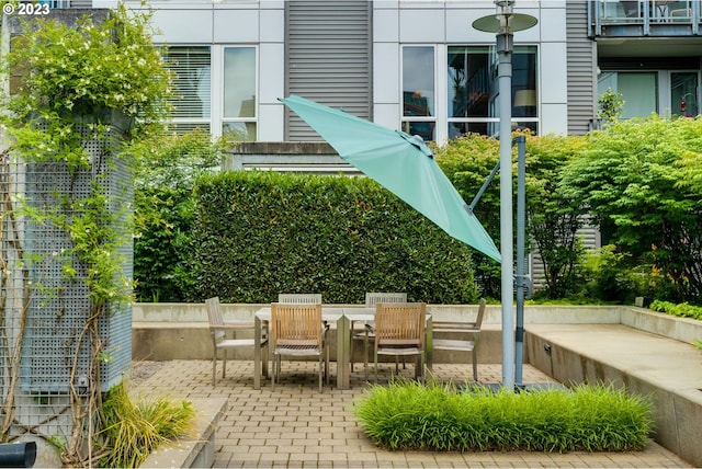 1125 NW 9th Ave Unit 512, Portland, OR 97209 - view of patio / terrace featuring outdoor dining space