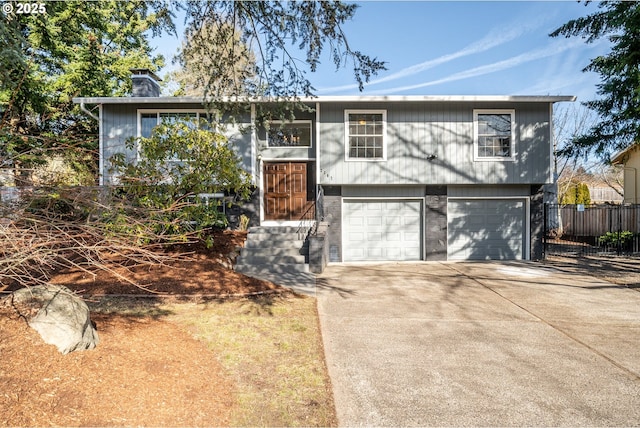 split foyer home featuring a garage