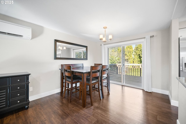 dining space with an AC wall unit, dark wood-type flooring, and an inviting chandelier