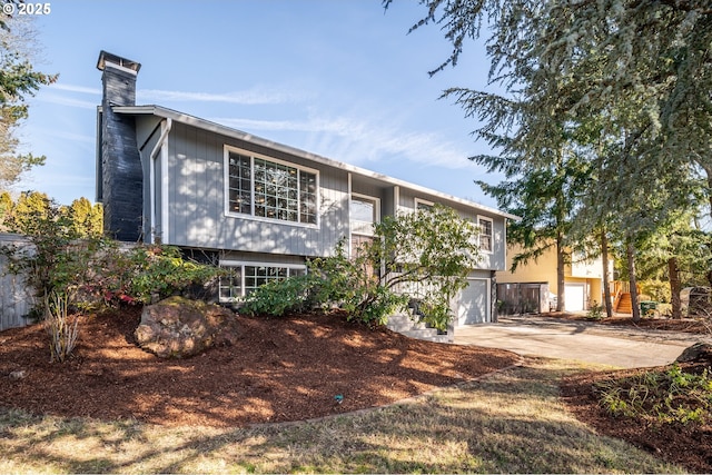 raised ranch featuring a garage