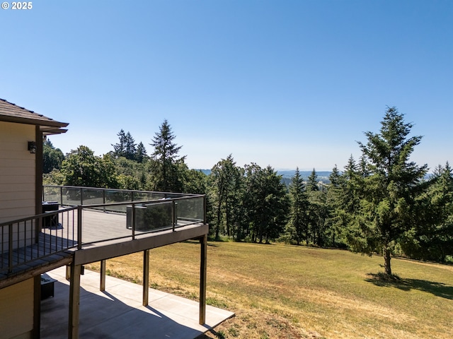 9684 Ankeny Crest Ln S, Salem, OR 97306 - view of grassy yard with a patio area, a forest view, and a deck