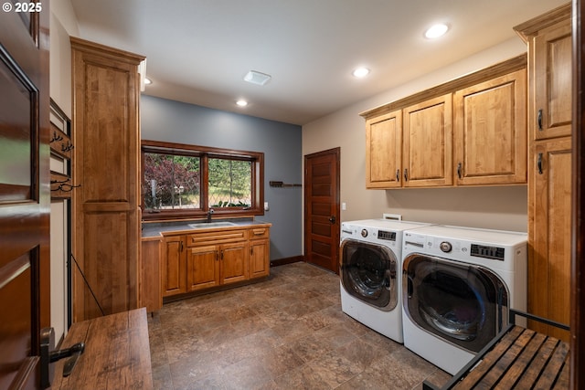 9684 Ankeny Crest Ln S, Salem, OR 97306 - laundry area featuring cabinet space, washer and clothes dryer, recessed lighting, baseboards, and stone finish floors