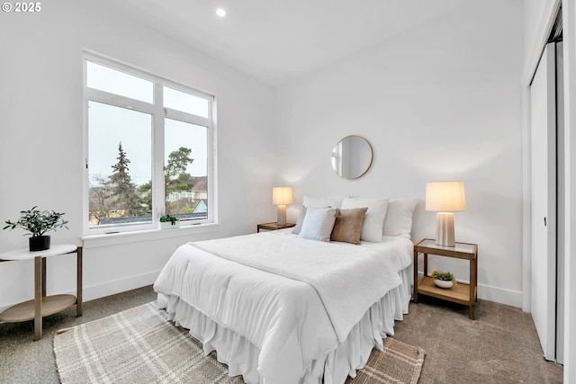 bedroom with carpet floors and a closet