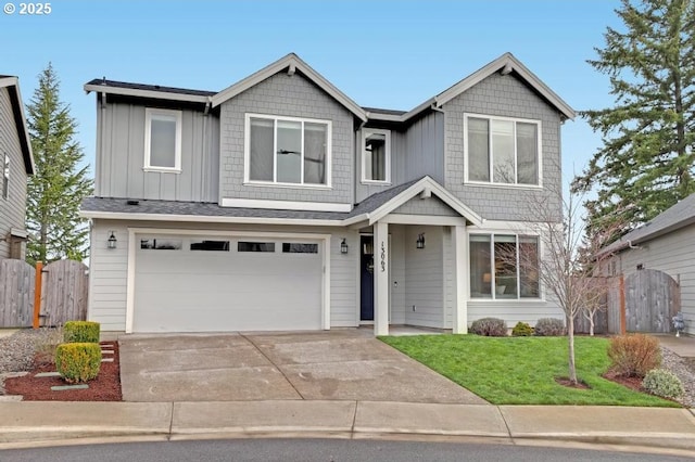 13063 SW Foran Hills Ct, Tigard, OR 97224 - view of front of property with concrete driveway, a garage, and board and batten siding