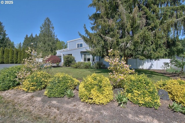 view of yard with fence