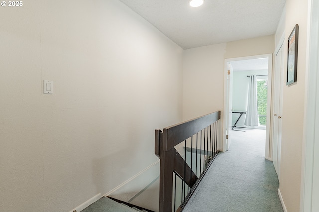 1659 NW Bridgeway Ln, Beaverton, OR 97006 - hallway featuring an upstairs landing, carpet, baseboards, and recessed lighting