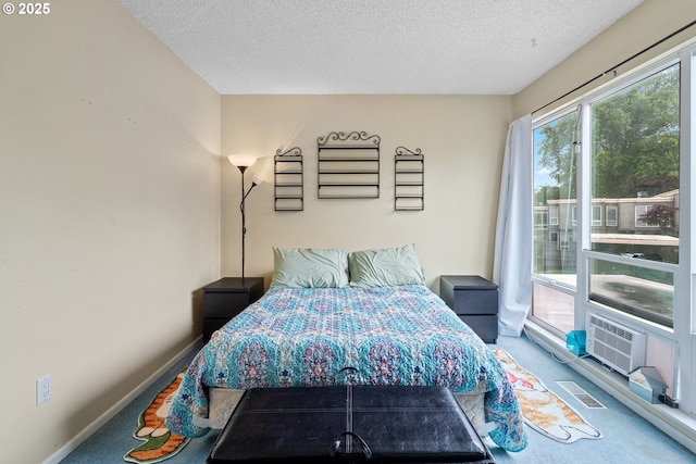 1659 NW Bridgeway Ln, Beaverton, OR 97006 - bedroom with carpet flooring, a textured ceiling, and baseboards