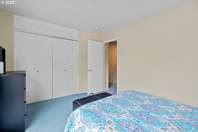 1659 NW Bridgeway Ln, Beaverton, OR 97006 - carpeted bedroom with a closet and a textured ceiling