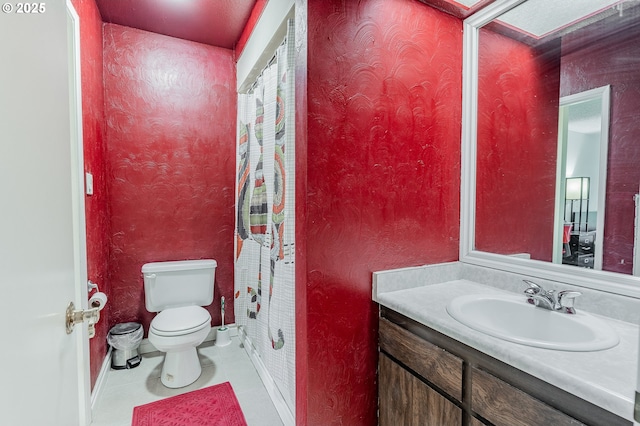 1659 NW Bridgeway Ln, Beaverton, OR 97006 - full bath featuring toilet, vanity, and baseboards