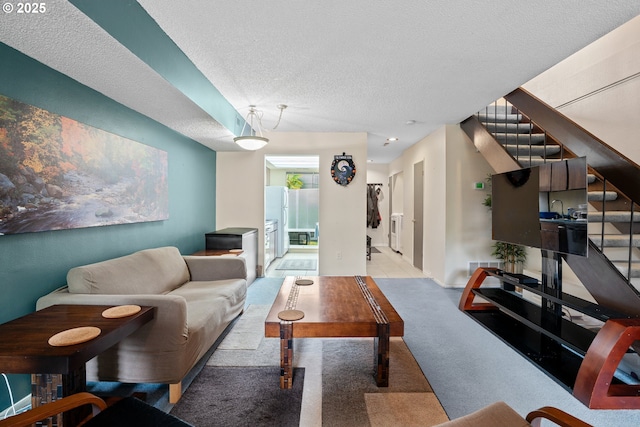 1659 NW Bridgeway Ln, Beaverton, OR 97006 - living area with stairway, a textured ceiling, and carpet floors