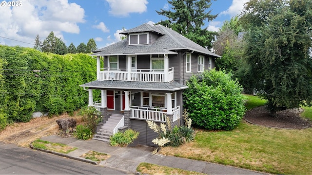 11151117 N Beech St, Portland, OR 97227 - view of front of property with covered porch, stairs, a shingled roof, a balcony, and a front lawn