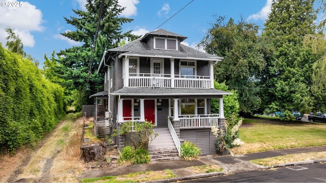 11151117 N Beech St, Portland, OR 97227 - view of front facade featuring covered porch, stairs, a balcony, and roof with shingles