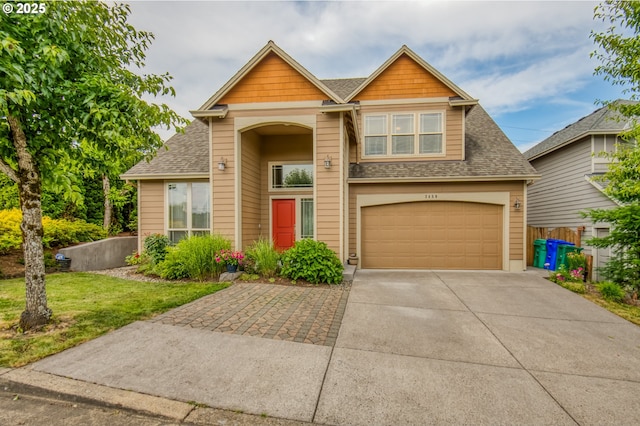 2459 SW Sandlewood Ln, Gresham, OR 97080 - view of front of house with driveway, roof with shingles, a garage, and a front lawn