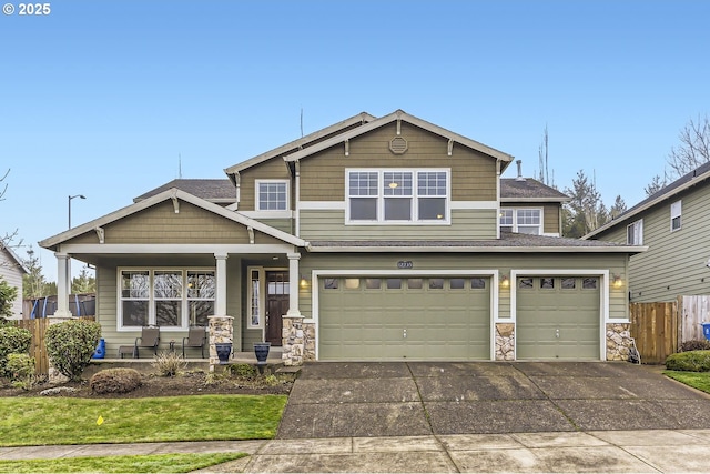 craftsman house featuring a porch and a garage