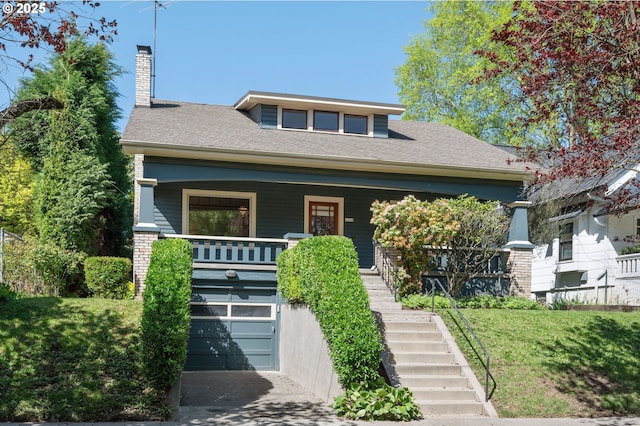 bungalow-style house with a chimney, driveway, covered porch, a garage, and stairs