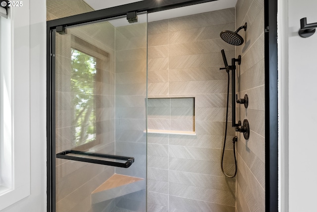 full bathroom featuring a stall shower