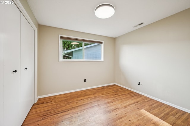 1631 N Clark St, Cornelius, OR 97113 - unfurnished bedroom with wood finished floors and a closet