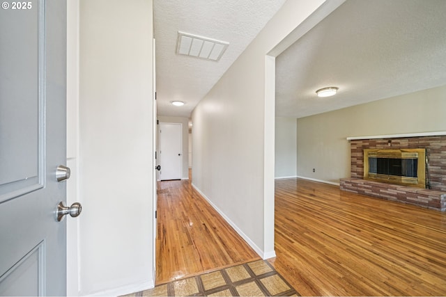 1631 N Clark St, Cornelius, OR 97113 - hall featuring wood finished floors and a textured ceiling