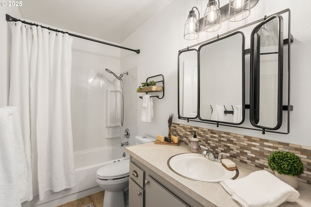 7538 SW Barnes Rd Unit H, Portland, OR 97225 - full bathroom with toilet, backsplash, vanity, and shower / tub combo