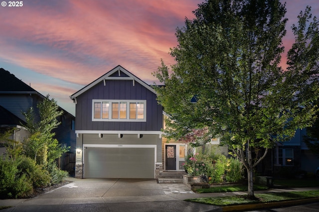 13864 SE Nightingale Ave, Happy Valley, OR 97015 - craftsman house featuring board and batten siding, stone siding, concrete driveway, and a garage
