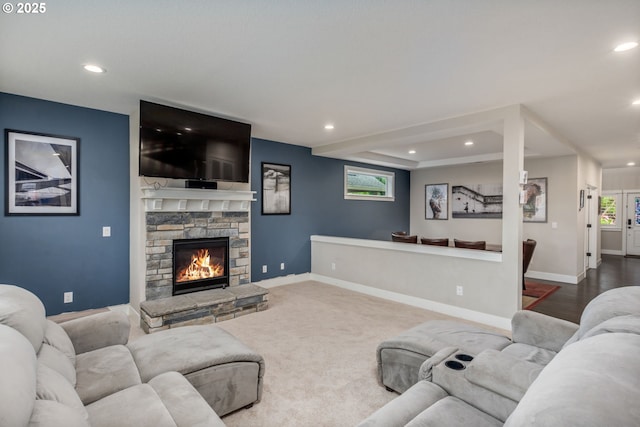 13864 SE Nightingale Ave, Happy Valley, OR 97015 - living area featuring healthy amount of natural light, recessed lighting, and a stone fireplace