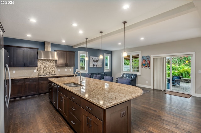 13864 SE Nightingale Ave, Happy Valley, OR 97015 - kitchen featuring wall chimney exhaust hood, stainless steel appliances, dark wood finished floors, plenty of natural light, and recessed lighting