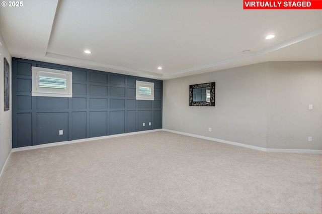 13864 SE Nightingale Ave, Happy Valley, OR 97015 - carpeted empty room featuring a decorative wall and recessed lighting