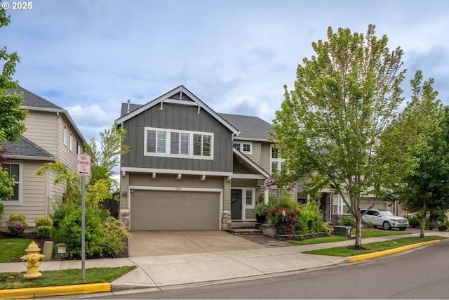 13864 SE Nightingale Ave, Happy Valley, OR 97015 - craftsman house with board and batten siding, a garage, stone siding, and concrete driveway