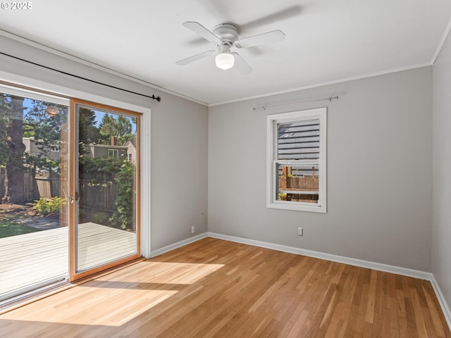 4561 NE 35th Ave, Portland, OR 97211 - empty room with crown molding, light wood-style flooring, and ceiling fan