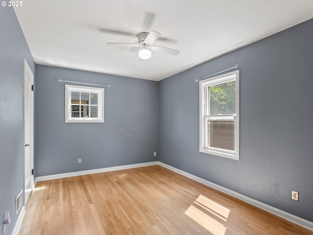 4561 NE 35th Ave, Portland, OR 97211 - unfurnished room with light wood-style flooring and a ceiling fan