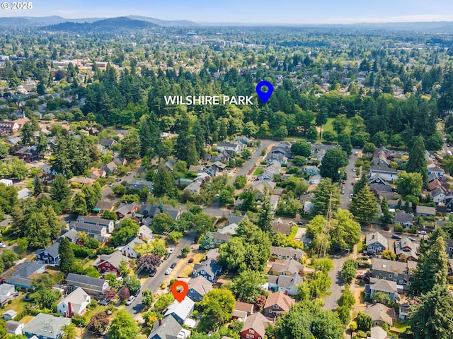 4561 NE 35th Ave, Portland, OR 97211 - aerial view of property and surrounding area with nearby suburban area and mountains