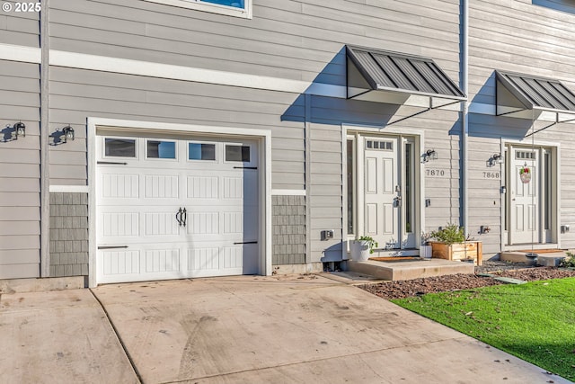 property entrance featuring a garage