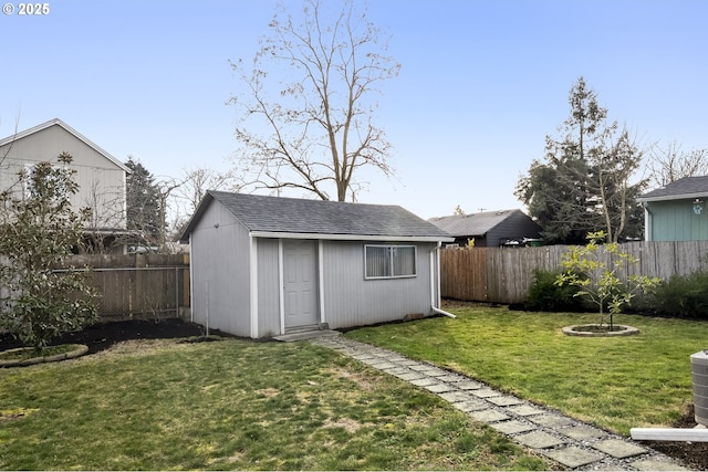 view of outdoor structure featuring a yard