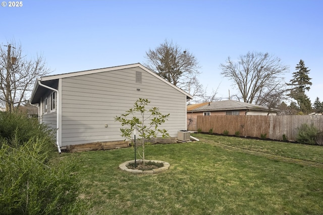 view of yard with central AC