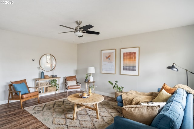 living room with wood-type flooring and ceiling fan