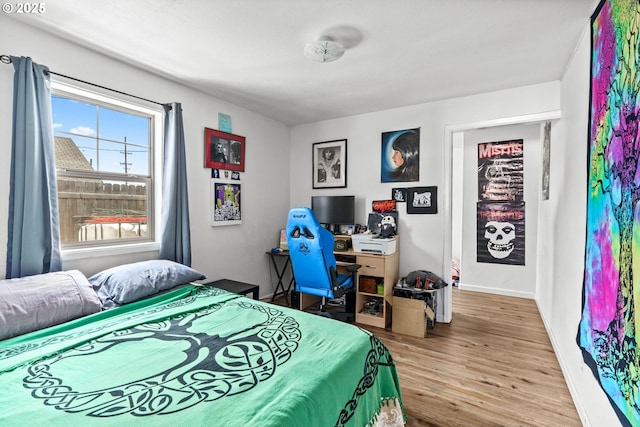 185 N Seneca Rd, Eugene, OR 97402 - bedroom featuring wood finished floors and baseboards