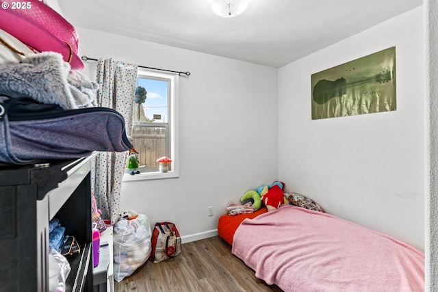 185 N Seneca Rd, Eugene, OR 97402 - bedroom with wood finished floors and baseboards